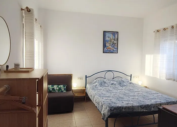 Rhea Seaside Karianí